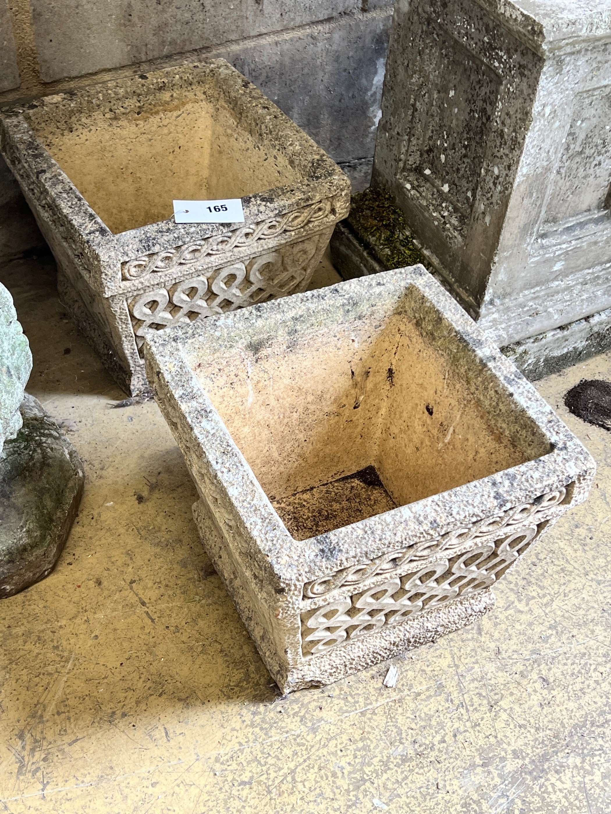 A pair of small reconstituted stone square garden planters, width 30cm, height 25cm